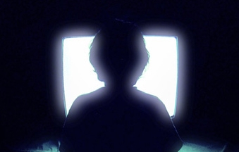 image of ghost in front of tv
